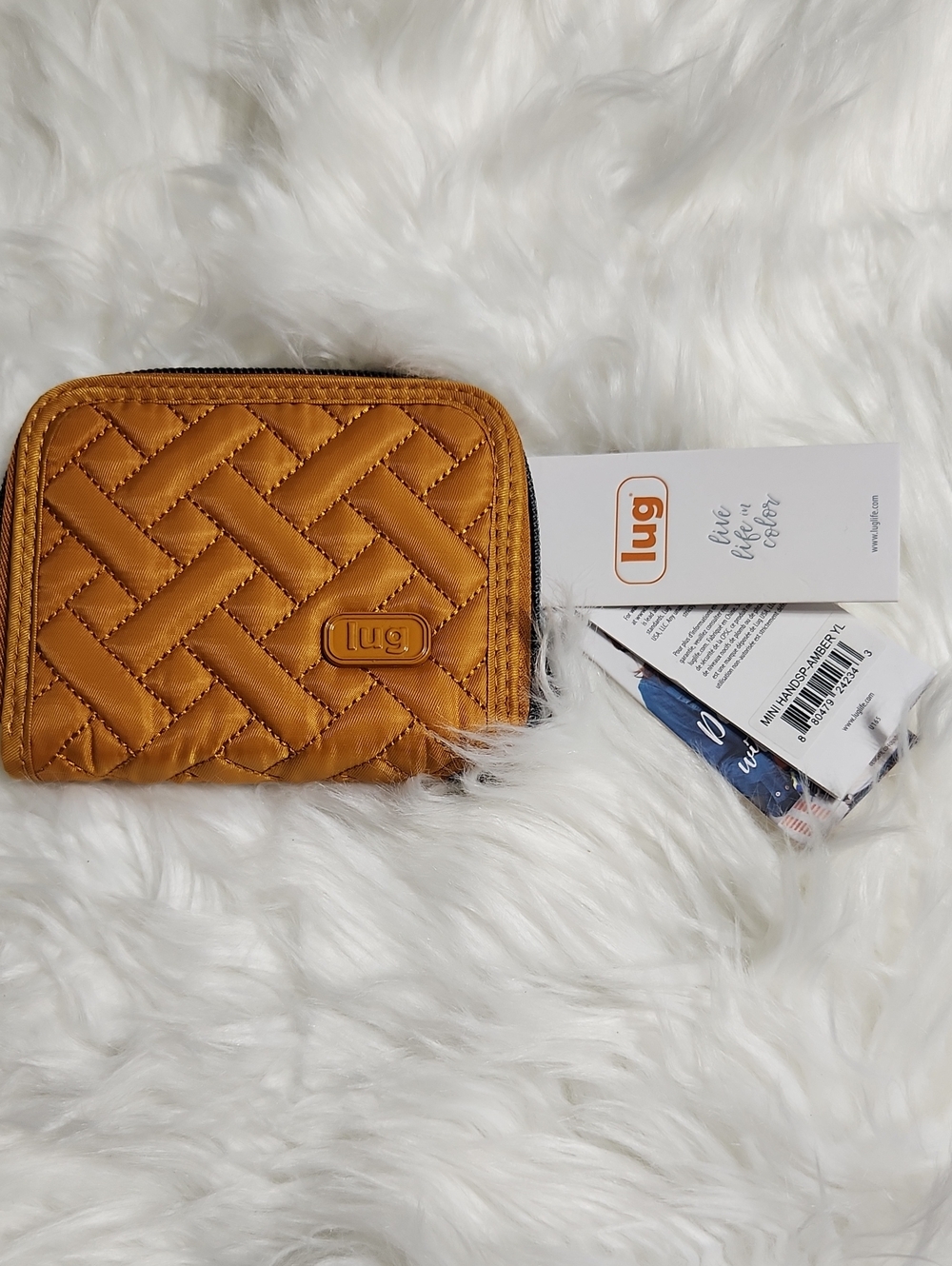 NWT. Lug Mini Handspring RFID Wallet- Amber Yellow